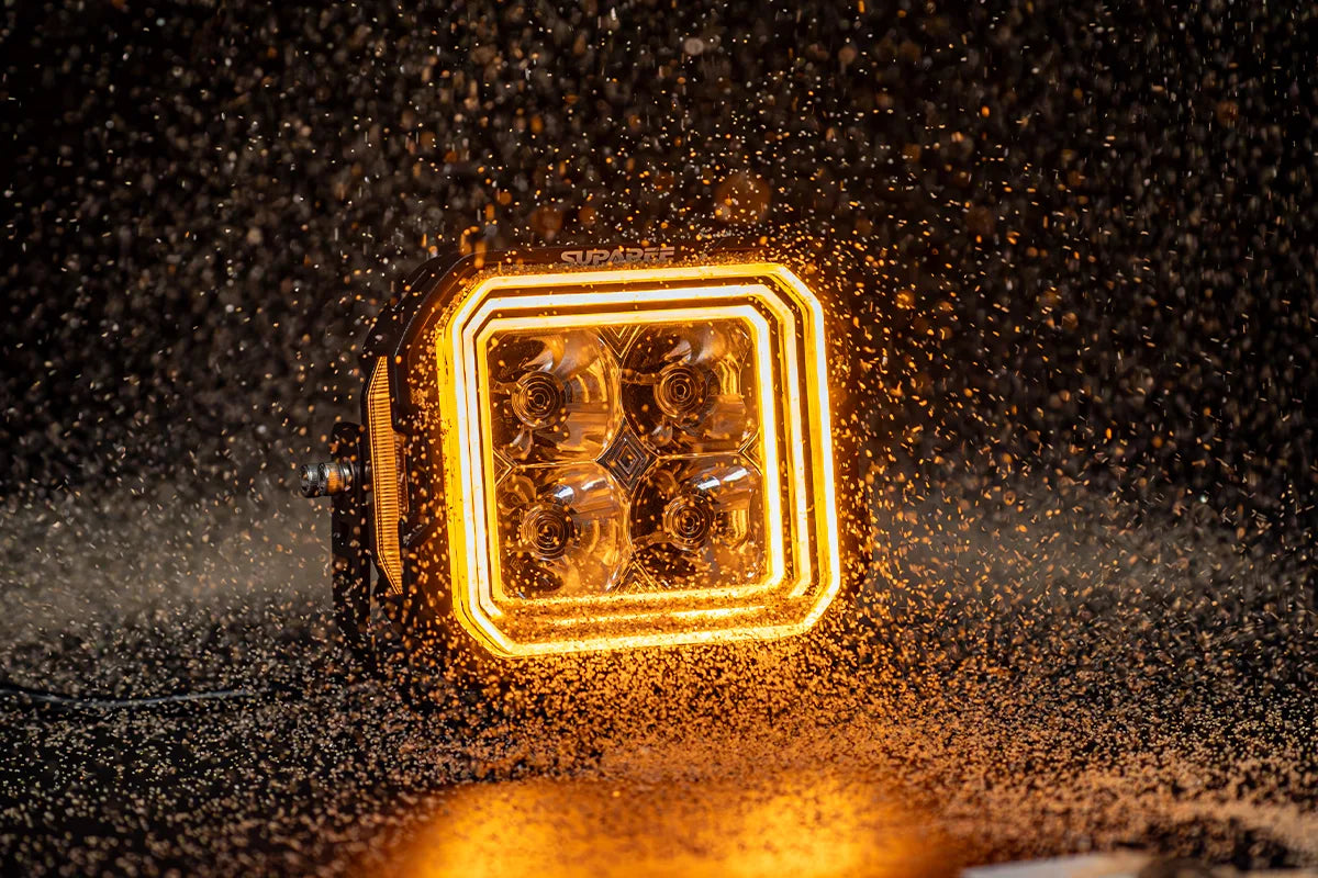 Hyper 5 RGBW LED pod light with amber backlight under water spray