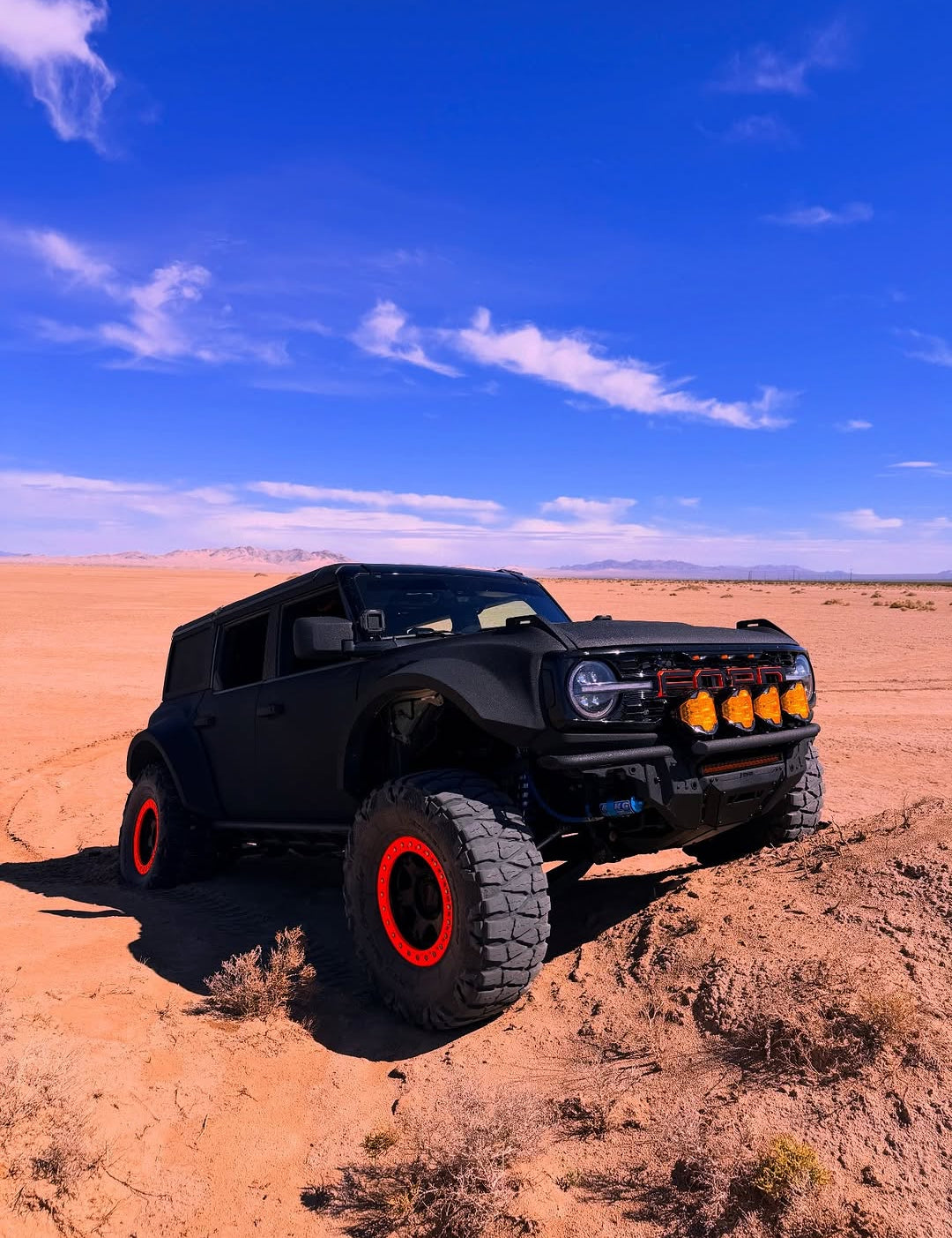 Off-road Jepp with SUPAREE HELM 7 lights driving on a rock land trail