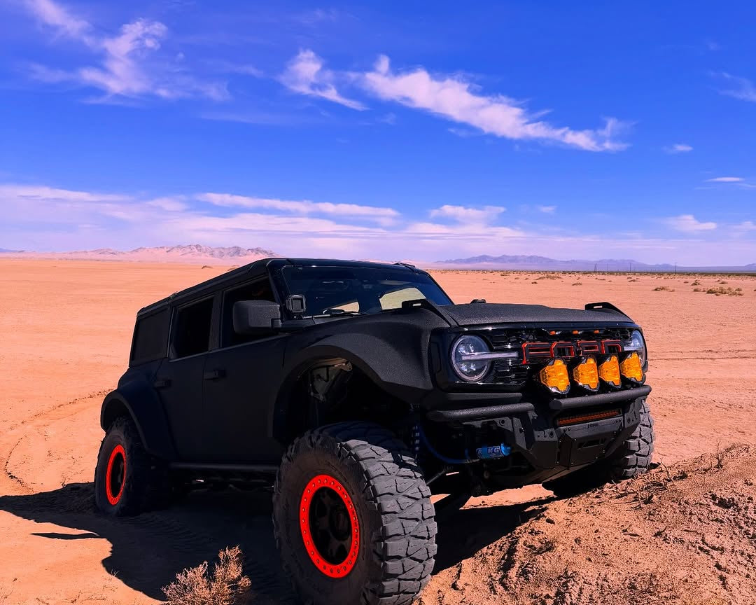 Off-road Jepp with SUPAREE HELM 7 lights driving on a rock land trail