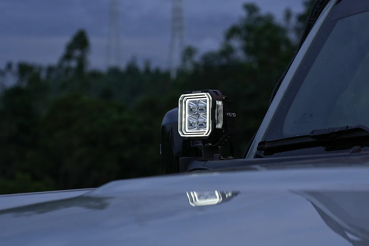 Hyper 5 RGBW LED pod light with white backlight installed at the A pillar