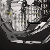 Close-up of SUPAREE HELM 7 optical reflector and lens design for controlled low beam and combo beam output